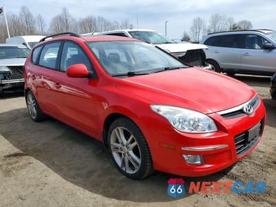 Czwarte zdjęcie samochodu z boku: 2010 HYUNDAI ELANTRA TOURING SE VIN:KMHDC8AE7AU068657 - miniatura