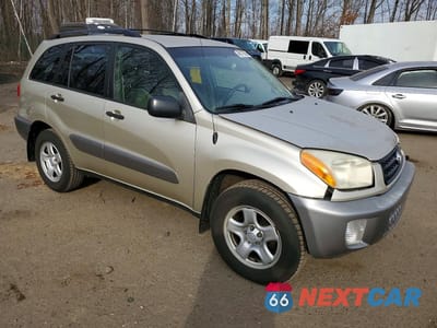 Czwarte zdjęcie samochodu z boku: 2003 TOYOTA RAV4 BASE VIN:JTEHH20V936092659 - miniatura