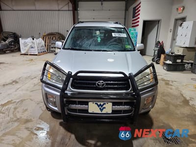 Piąte zdjęcie samochodu w środku: 2001 TOYOTA RAV4 BASE VIN:JTEHH20V216002698 - miniatura