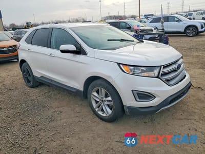 Czwarte zdjęcie samochodu z boku: 2015 FORD EDGE SEL VIN:2FMTK3J95FBC25958 - miniatura