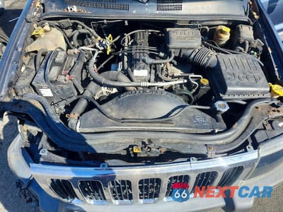 Zdjęcie 12 z 13 samochodu: 2001 JEEP GRAND CHEROKEE LAREDO VIN:1J4GW48S11C700338 - miniatura