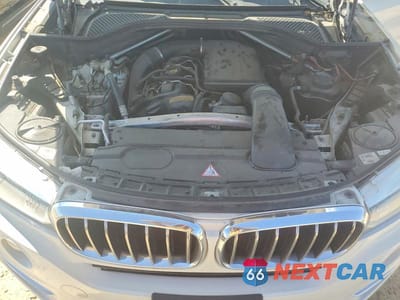 Zdjęcie 11 z 13 samochodu: 2014 BMW X5 SDRIVE35I VIN:5UXKR2C53E0C01272 - miniatura