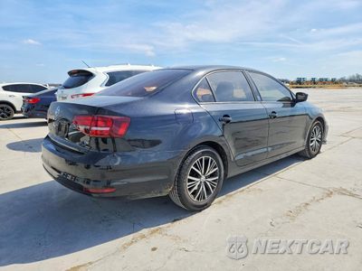 Trzecie zdjęcie samochodu z tyłu: 2018 VOLKSWAGEN JETTA VIN:3VWDB7AJ2JM209358 - miniatura