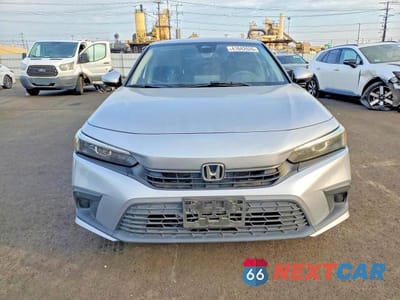 Piąte zdjęcie samochodu w środku: 2022 HONDA CIVIC LX VIN:2HGFE2F25NH530100 - miniatura