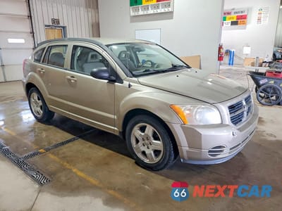 Czwarte zdjęcie samochodu z boku: 2009 DODGE CALIBER SXT VIN:1B3HB48A99D211254 - miniatura