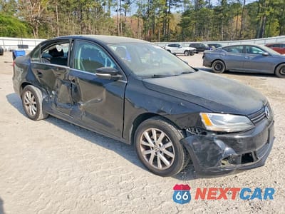Czwarte zdjęcie samochodu z boku: 2013 VOLKSWAGEN JETTA SE VIN:3VWDX7AJ0DM279186 - miniatura