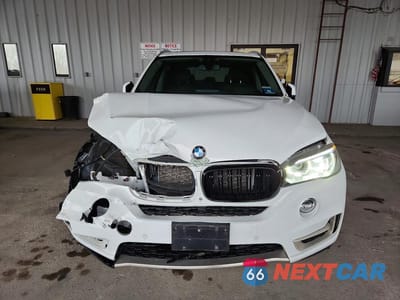 Piąte zdjęcie samochodu w środku: 2014 BMW X5 XDRIVE35I VIN:5UXKR0C51E0K47863 - miniatura