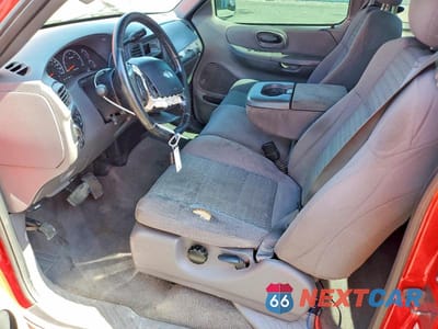 Zdjęcie 7 z 13 samochodu: 2003 FORD F150 VIN:1FTRX07W43KB91329 - miniatura
