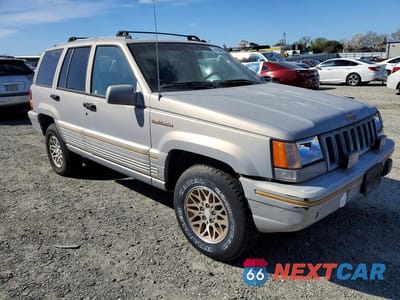 Czwarte zdjęcie samochodu z boku: 1995 JEEP GRAND CHEROKEE LIMITED VIN:1J4GZ78Y8SC516397 - miniatura