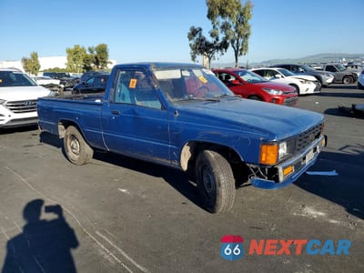 Czwarte zdjęcie samochodu z boku: 1986 TOYOTA PICKUP BASE VIN:JT4RN50RXG0142144 - miniatura