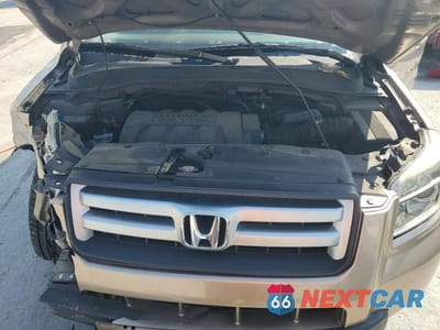 Zdjęcie 12 z 13 samochodu: 2006 HONDA PILOT EX VIN:5FNYF18576B009361 - miniatura