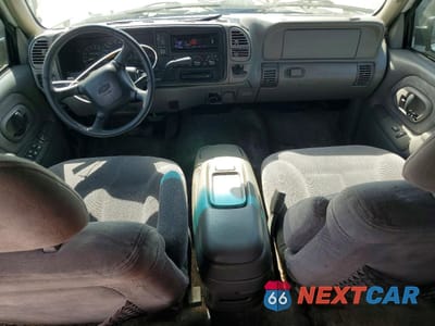 Zdjęcie 8 z 14 samochodu: 1999 CHEVROLET TAHOE C1500 VIN:1GNEC13R8XR118291 - miniatura