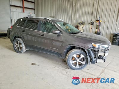 Czwarte zdjęcie samochodu z boku: 2019 JEEP CHEROKEE LIMITED VIN:1C4PJMDX6KD438088 - miniatura