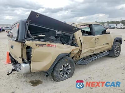 Trzecie zdjęcie samochodu z tyłu: 2020 TOYOTA TACOMA TRD OFF-ROAD VIN:3TMCZ5AN4LM300250 - miniatura