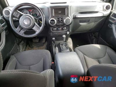 Zdjęcie 8 z 12 samochodu: 2018 JEEP WRANGLER UNLIMITED SAHARA VIN:1C4BJWEG4JL900169 - miniatura