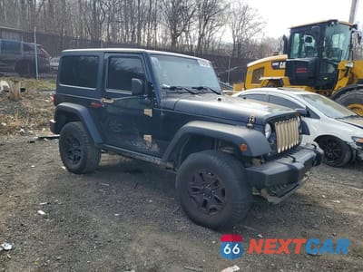 Czwarte zdjęcie samochodu z boku: 2016 JEEP WRANGLER SPORT VIN:1C4AJWAG5GL120174 - miniatura