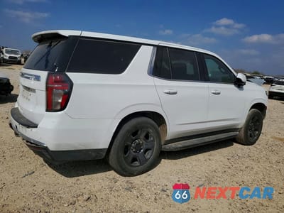 Trzecie zdjęcie samochodu z tyłu: 2022 CHEVROLET TAHOE C1500 VIN:1GNSCLED6NR247787 - miniatura