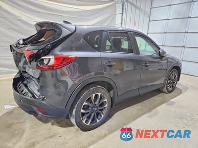 Trzecie zdjęcie samochodu z tyłu: 2016 MAZDA CX-5 GT VIN:JM3KE4DY5G0727041 - miniatura