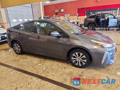 Czwarte zdjęcie samochodu z boku: 2022 TOYOTA PRIUS LE AWD-E VIN:JTDL9MFU6N3035037 - miniatura