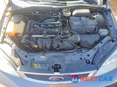 Zdjęcie 11 z 12 samochodu: 2007 FORD FOCUS ZX4 VIN:1FAHP34NX7W344633 - miniatura