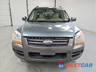 Piąte zdjęcie samochodu w środku: 2007 KIA SPORTAGE LX VIN:KNDJF724277414720 - miniatura