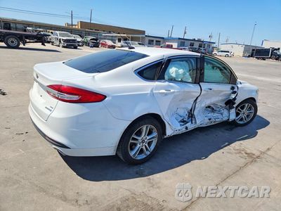 Trzecie zdjęcie samochodu z tyłu: 2018 FORD FUSION SE HYBRID VIN:3FA6P0LU6JR171637 - miniatura