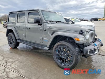 Czwarte zdjęcie samochodu z boku: 2022 JEEP WRANGLER UNLIMITED SAHARA 4XE VIN:1C4JJXP69NW205308 - miniatura