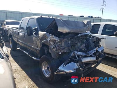 Czwarte zdjęcie samochodu z boku: 2002 FORD F350 SRW SUPER DUTY VIN:1FTSW31F52EC13849 - miniatura