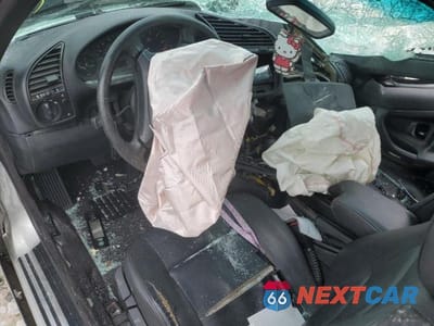 Zdjęcie 8 z 12 samochodu: 1998 BMW 323 IC AUTOMATIC VIN:WBABJ8328WEM21958 - miniatura