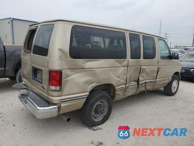 Trzecie zdjęcie samochodu z tyłu: 1999 FORD ECONOLINE E350 SUPER DUTY WAGON VIN:1FBNE31S9XHB82919 - miniatura