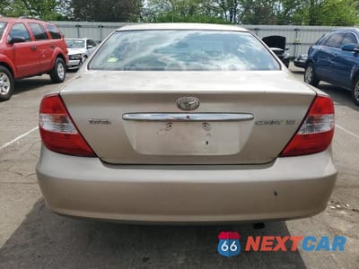 Zdjęcie 6 z 12 samochodu: 2002 TOYOTA CAMRY LE VIN:4T1BF30K32U531159 - miniatura