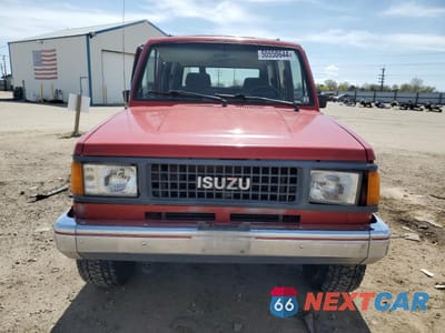 Piąte zdjęcie samochodu w środku: 1990 ISUZU TROOPER VIN:JACCH58R7L8917768 - miniatura