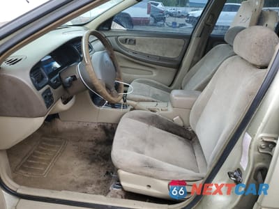 Zdjęcie 7 z 12 samochodu: 1999 NISSAN ALTIMA VIN:1N4DL01D2XC193518 - miniatura