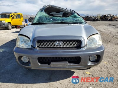 Piąte zdjęcie samochodu w środku: 2003 HYUNDAI SANTA FE GLS VIN:KM8SC13D63U461796 - miniatura