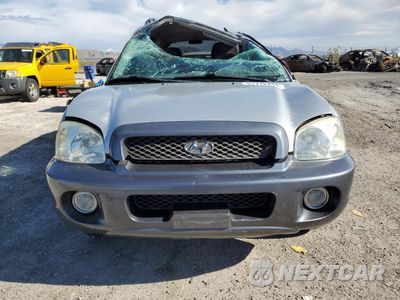 Piąte zdjęcie samochodu w środku: 2003 HYUNDAI SANTA FE GLS VIN:KM8SC13D63U461796 - miniatura
