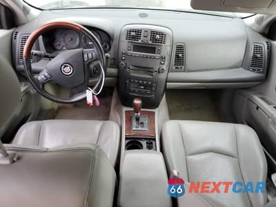 Zdjęcie 8 z 13 samochodu: 2004 CADILLAC SRX VIN:1GYDE63A240141274 - miniatura