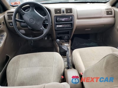 Zdjęcie 8 z 12 samochodu: 1998 MAZDA PROTEGE DX VIN:JM1BC1418W0234016 - miniatura