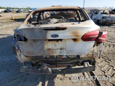 Zdjęcie 6 z 12 samochodu: 2018 FORD FOCUS S VIN:1FADP3E2XJL293615 - miniatura