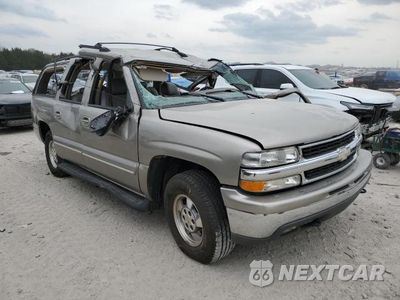 Czwarte zdjęcie samochodu z boku: 2003 CHEVROLET SUBURBAN K1500 VIN:1GNFK16Z93J267675 - miniatura