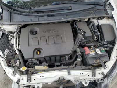 Zdjęcie 11 z 13 samochodu: 2017 TOYOTA COROLLA L VIN:5YFBURHE7HP610352 - miniatura