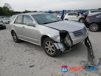 Czwarte zdjęcie samochodu z boku: 2004 CADILLAC SRX VIN:1GYDE63A240141274 - miniatura