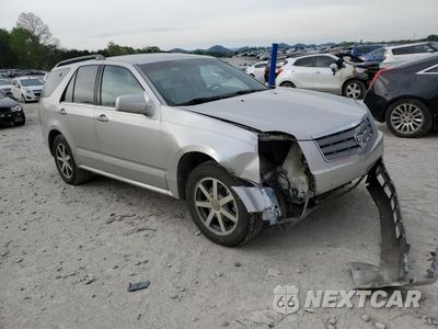 Czwarte zdjęcie samochodu z boku: 2004 CADILLAC SRX VIN:1GYDE63A240141274 - miniatura