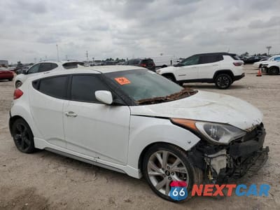 Czwarte zdjęcie samochodu z boku: 2016 HYUNDAI VELOSTER TURBO VIN:KMHTC6AE9GU282493 - miniatura