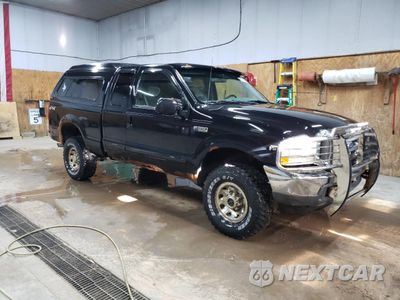 Czwarte zdjęcie samochodu z boku: 2002 FORD F350 SRW SUPER DUTY VIN:1FTSX31L52EB85330 - miniatura
