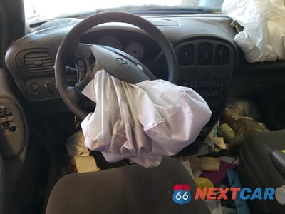 Zdjęcie 8 z 14 samochodu: 2004 DODGE CARAVAN SXT VIN:1D4GP45R44B598034 - miniatura