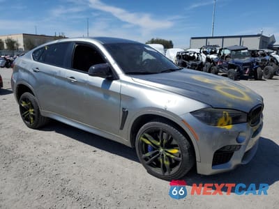Czwarte zdjęcie samochodu z boku: 2015 BMW X6 M VIN:5YMKW8C56F0G93804 - miniatura