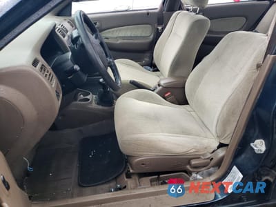 Zdjęcie 7 z 12 samochodu: 1998 MAZDA PROTEGE DX VIN:JM1BC1418W0234016 - miniatura
