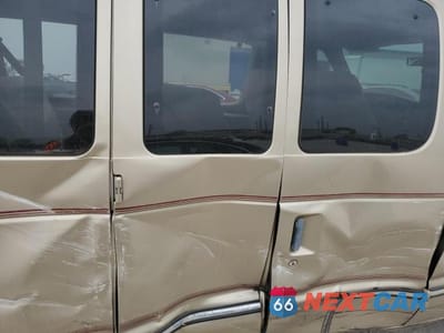 Zdjęcie 11 z 13 samochodu: 1999 FORD ECONOLINE E350 SUPER DUTY WAGON VIN:1FBNE31S9XHB82919 - miniatura