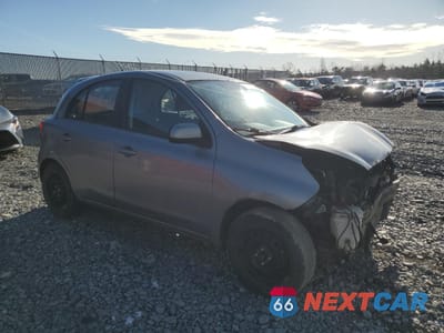 Czwarte zdjęcie samochodu z boku: 2015 NISSAN MICRA VIN:3N1CK3CP3FL211810 - miniatura