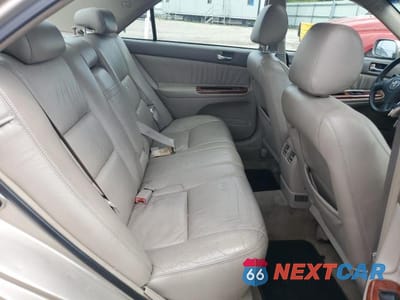 Zdjęcie 10 z 12 samochodu: 2002 TOYOTA CAMRY LE VIN:4T1BF30K32U531159 - miniatura